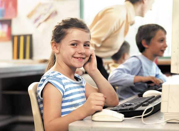 Young girl at a computer