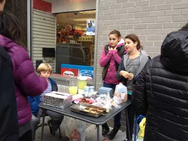 The-editors-children-and-a-friend-who-hosted-a-bake-sale-to-benefit-Hurricane-Sandy-victims.