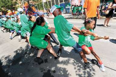 Kids enjoy the lazy, hazy days of summer in the park