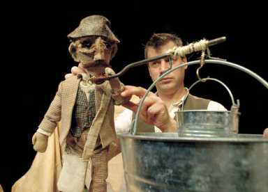 Children enjoy a presentation by the Scottish troupe