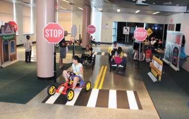Children learn all about road safety at the Summer Safety exhibit