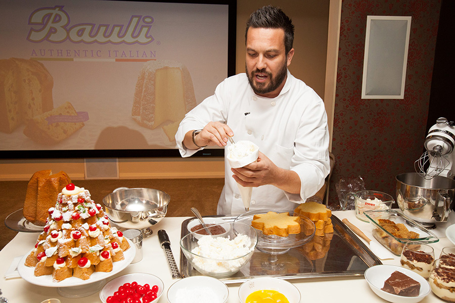 Bauli brand ambassador Fabio Viviani gives a demo at the Bauli NYC launch party.