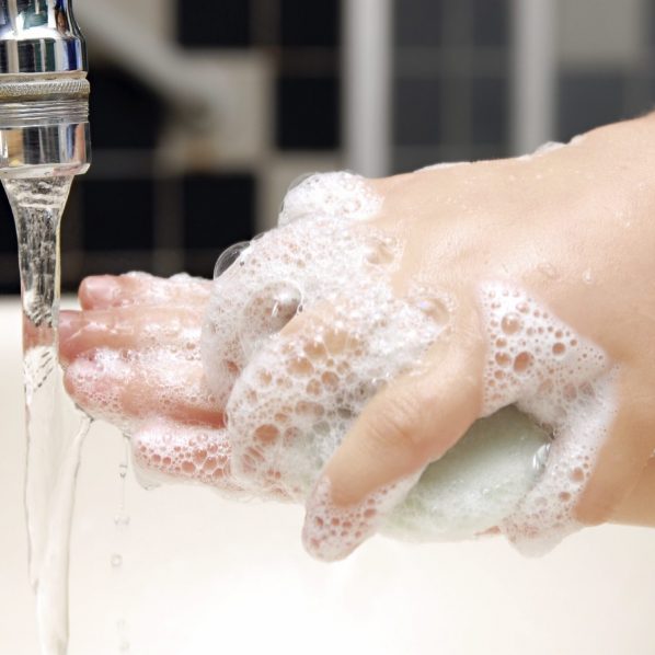 One of the best ways for kids and adults to prevent the spread of the flu includes washing hands often