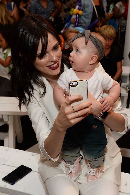 Coco Rocha and her daughter Ioni at the Paul Frank Circus Jumble show at NYFW
