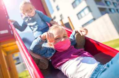 Happy,Children,In,Eastern,Europe,Playing,With,Face,Masks,On