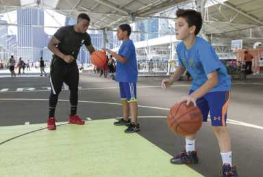 Polish your b-ball skills with basketball clinics at Brooklyn Brige Park Pier 2