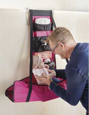 Game changer: Portable diaper changing station helps out dads