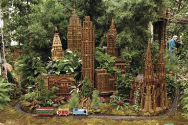 Watch model trains glide through a mini-New York City
