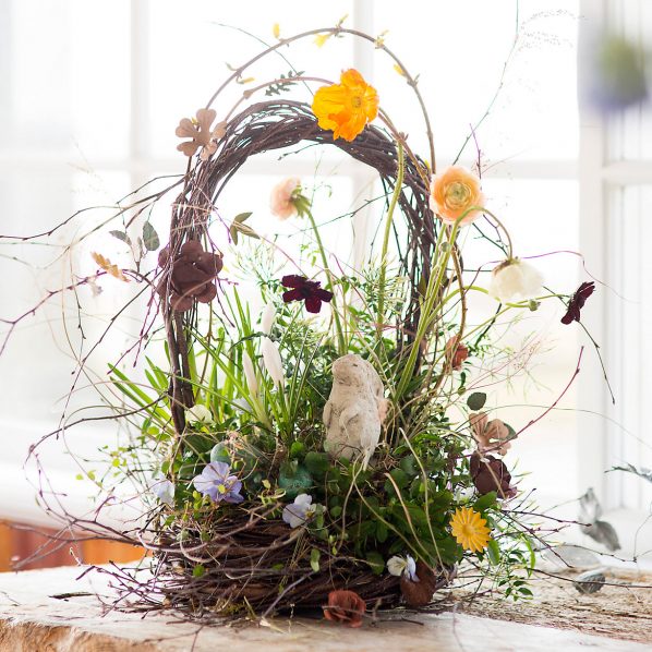 Easter basket made of rustic twigs and flowers from Terrain
