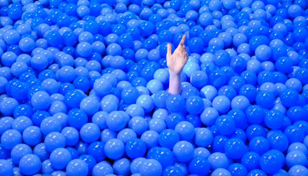 hand in blue balls