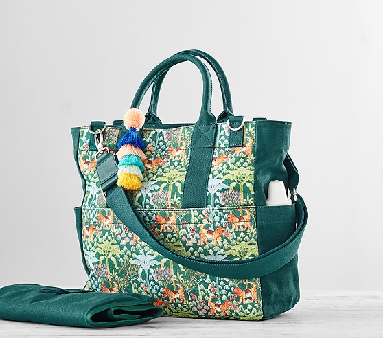 Green diaper bag with bohemian accents