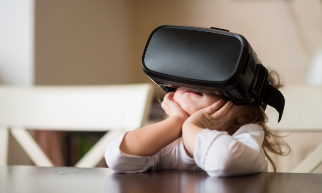 child using a virtual reality headset