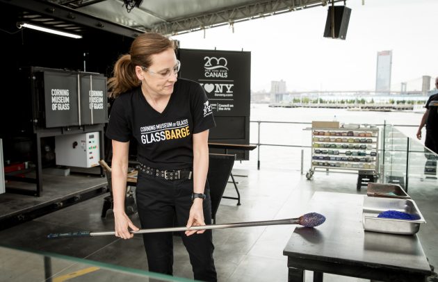 woman with glassblowing tools