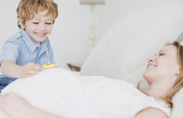 pregnant woman with toddler child