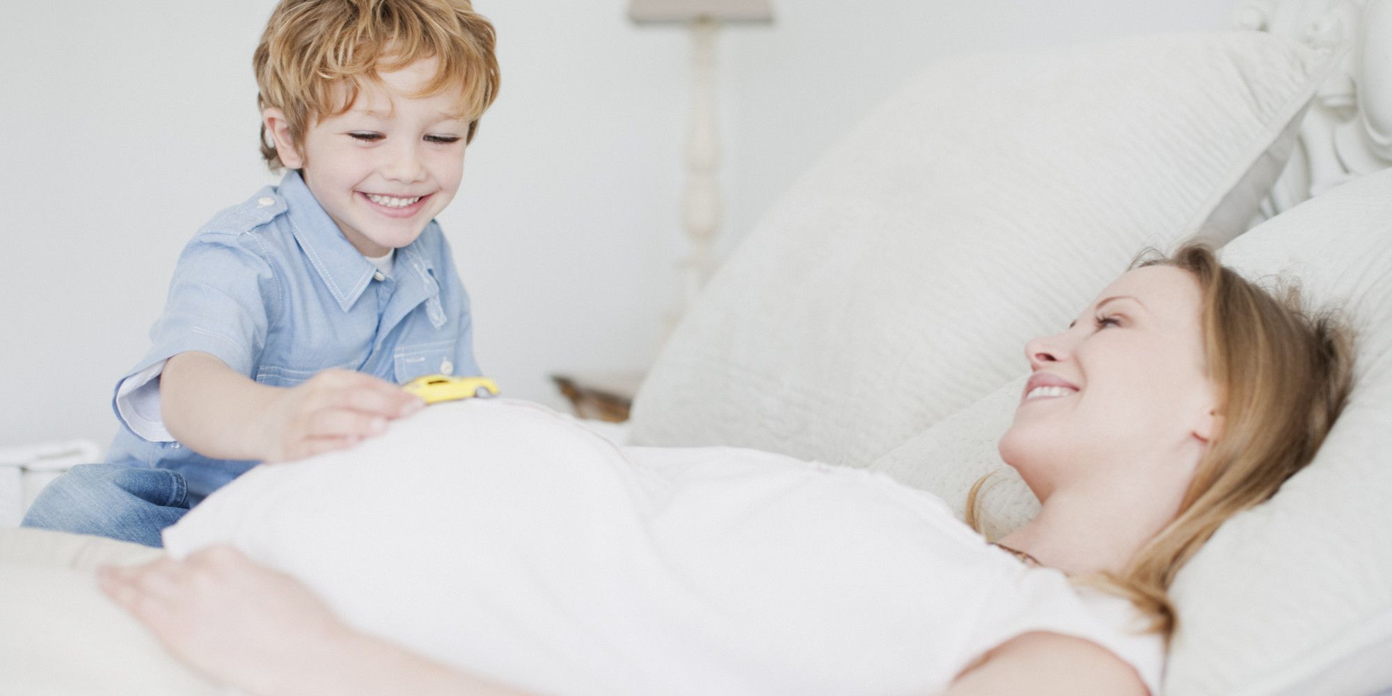 pregnant woman with toddler child