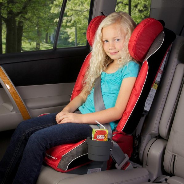 blond child in booster seat