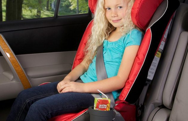 blond child in booster seat