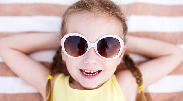 little girl wearing sunglasses
