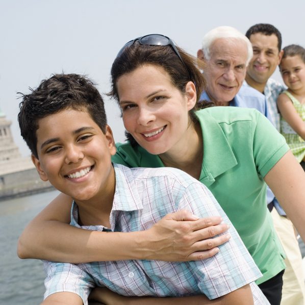 Family Touring New York Near Statue of Liberty National Monument