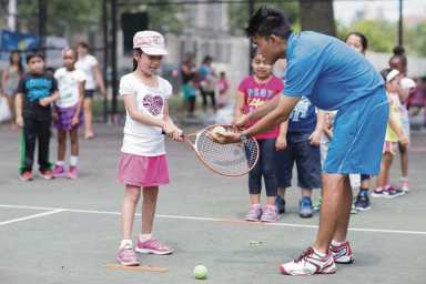Tennis in the Parks pairs kids with the pros for lessons in Queens parks