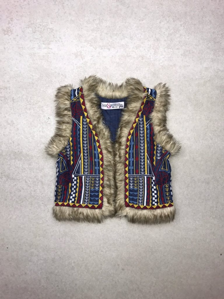 furry vest with boho details