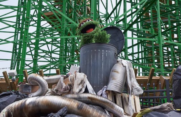 oscar the grouch on a roller coaster