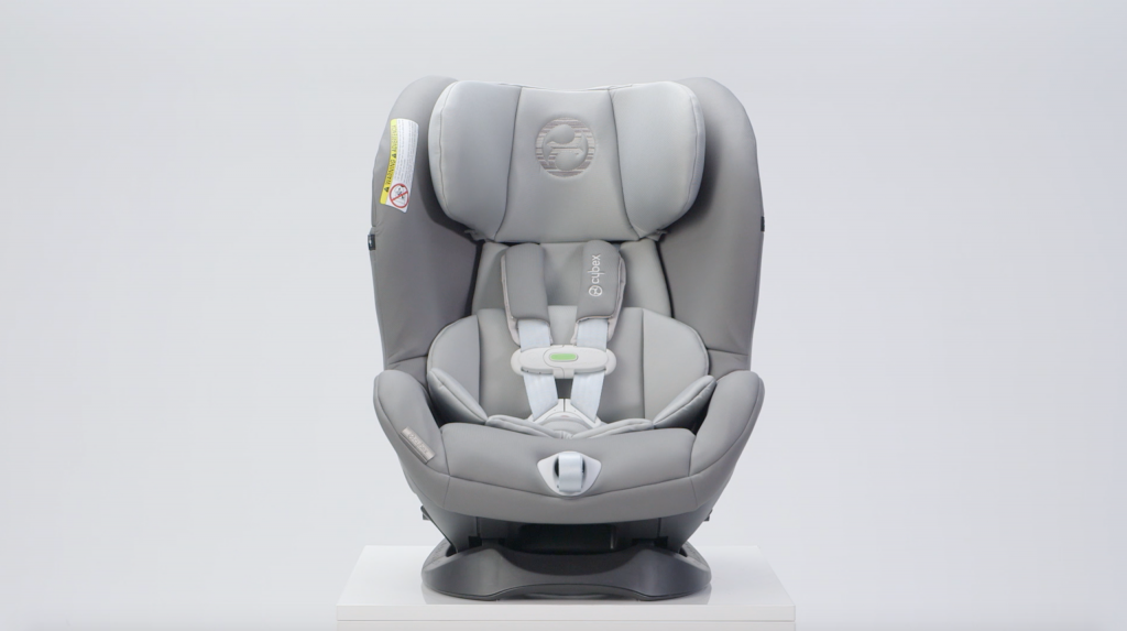 grey smart-[hone connected car seat on a light grey background