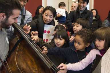Kids with cellist