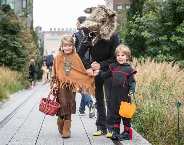 kids on high line dressed up trick-or-treating