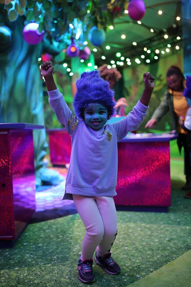 young child at the trolls experience in new york city