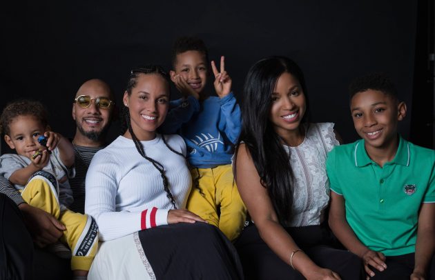 family photo with three adults and two kids