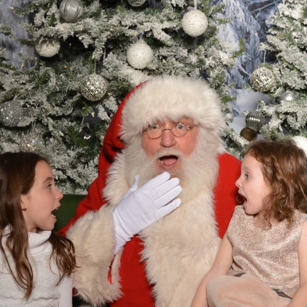 two little girls with santa
