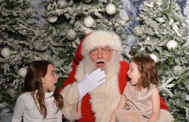 two little girls with santa
