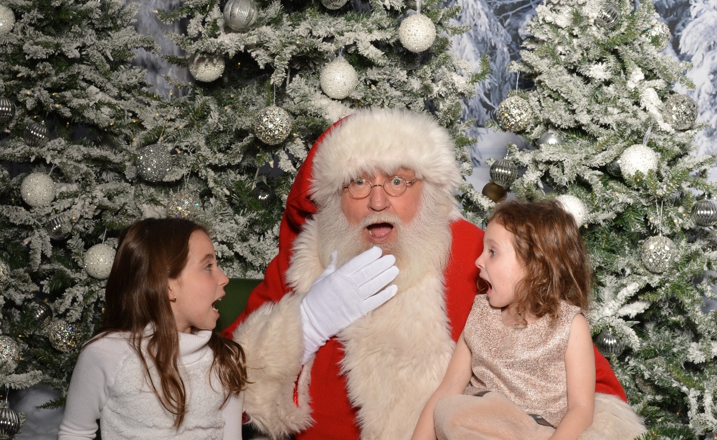 two little girls with santa