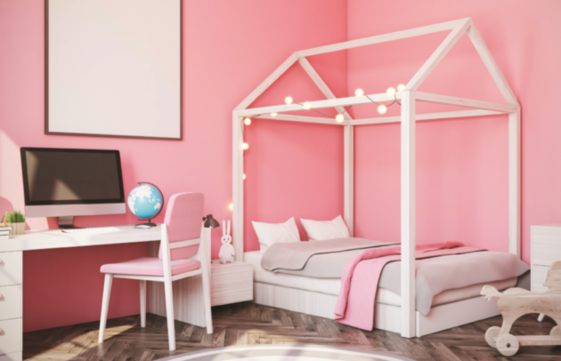 cute child's bedroom with pink walls and mod furntiure