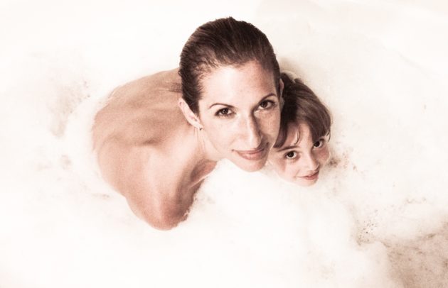 mother and child in a bathtub