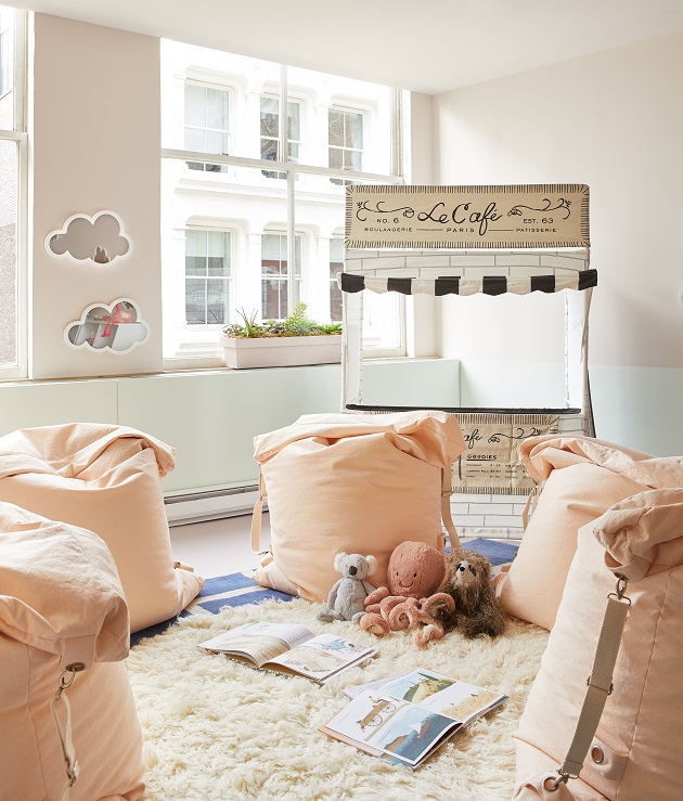 childrens playroom with pink beanbags