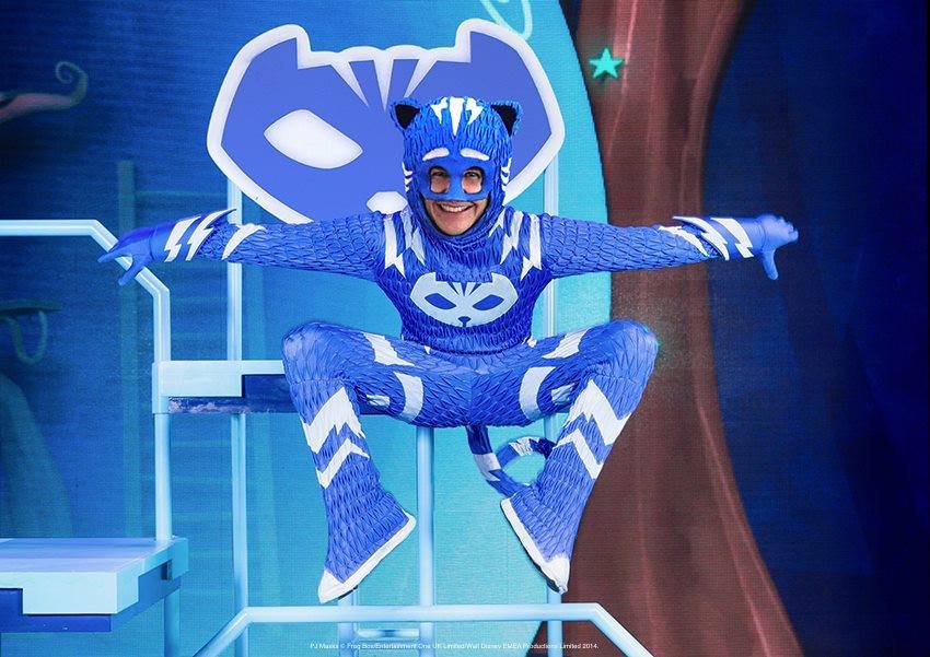 actor dressed as a blue cat in a children's musical