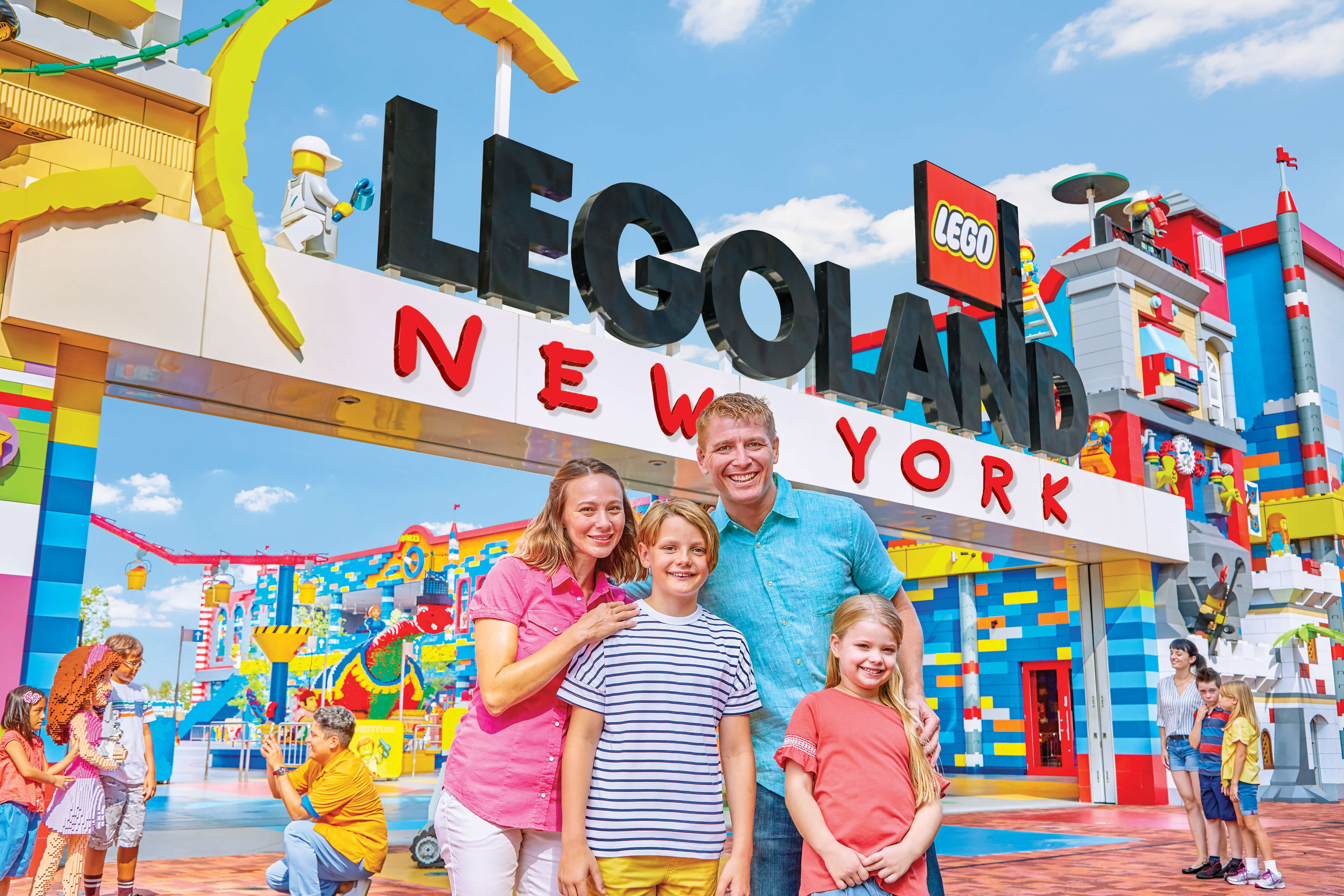 Picture of a family in front of LEGOLAND New York Entrance