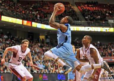 men playing basketball