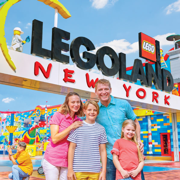 Picture of a family in front of LEGOLAND New York Entrance