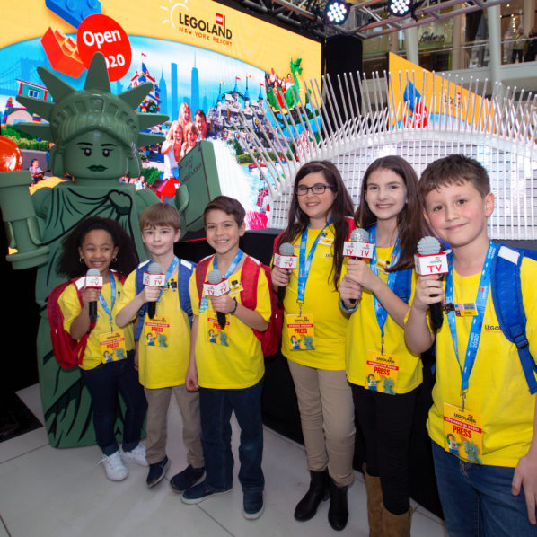 LEGOLAND New York's Kid Reporter Team in front of LEGOLAND's Oculus Model!