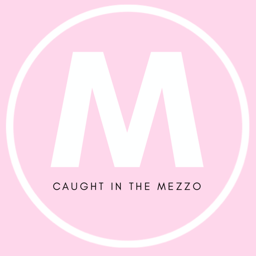 Caught in the Mezzo pink and white logo