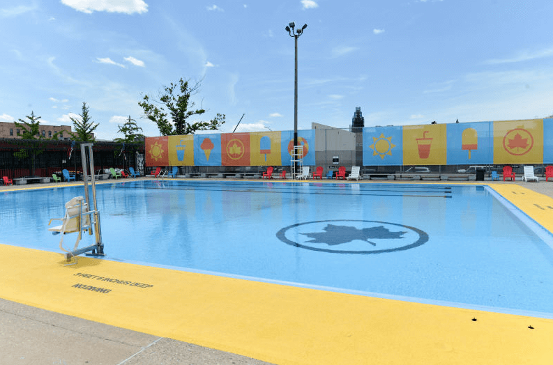 Douglass & DeGraw Pool photo with decor in the background