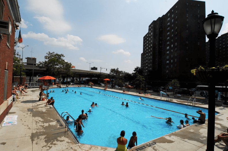 Families swim at Asser Levy pool.
