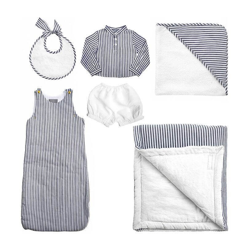 a black-and-white striped layette set including bib, shirt, shorts and more