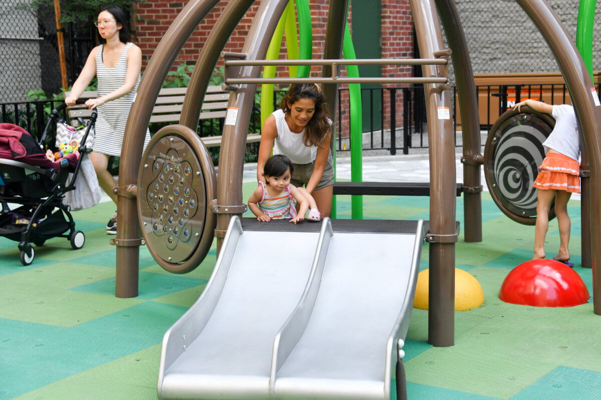 kid-going-down-slide-at-chelsea-green.jpg