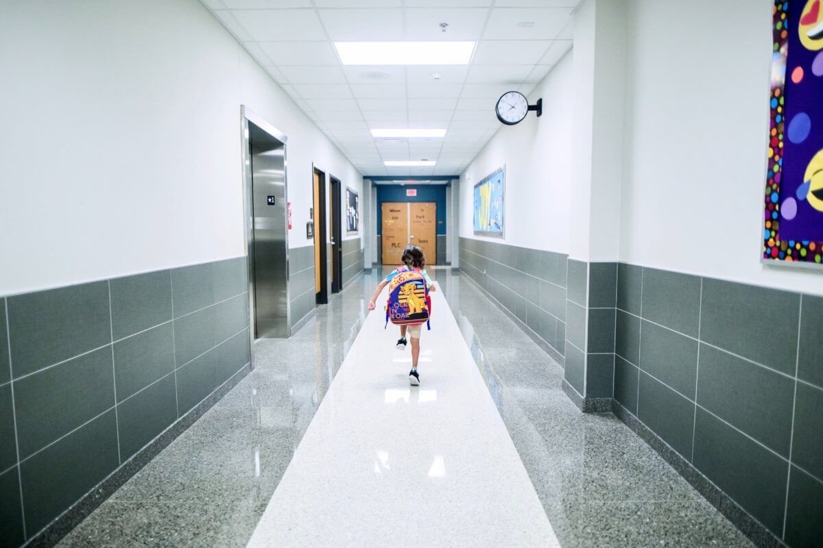 kid-running-down-the-hall-manhattan-private-schools.jpg