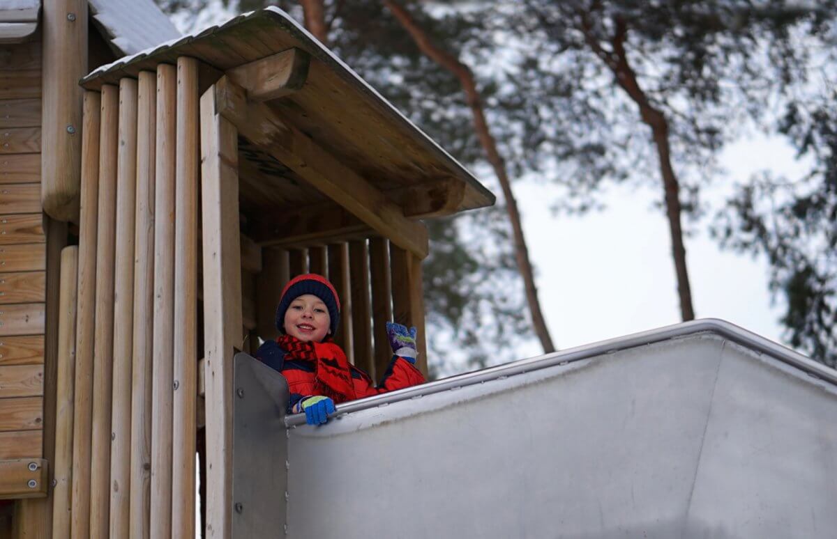 kid on a slide