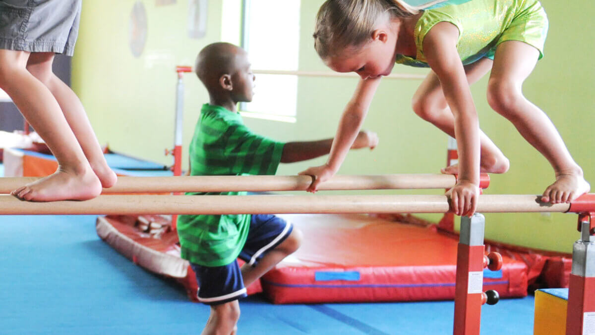 kids-playing-on-balance-beams-little-gym.jpg